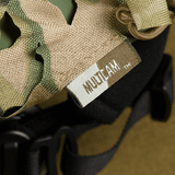 M‑Tac Vilha Hjelmcover Elite i MULTICAM-camouflage på FAST hjelm, beskytter mod snavs og slid, designet med Cordura 500D og Laser Cut mesh.