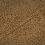 Close-up view of M-Tac Fleece Neck Gaiter med Snor material showcasing brown fleece texture.