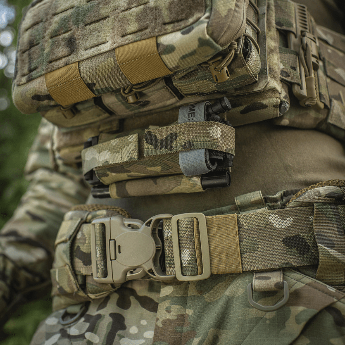 M‑Tac Tourniquet Pouch Elastic Gen.5 fastgjort til taktisk udstyr i camouflagedesign, holdbarhed og hurtig adgang.