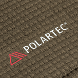 Nærbillede af Polartec® fleece materiale brugt i M-Tac Hjelm Watch Cap Polartec, fremhæver varmen og komforten i køligt vejr.